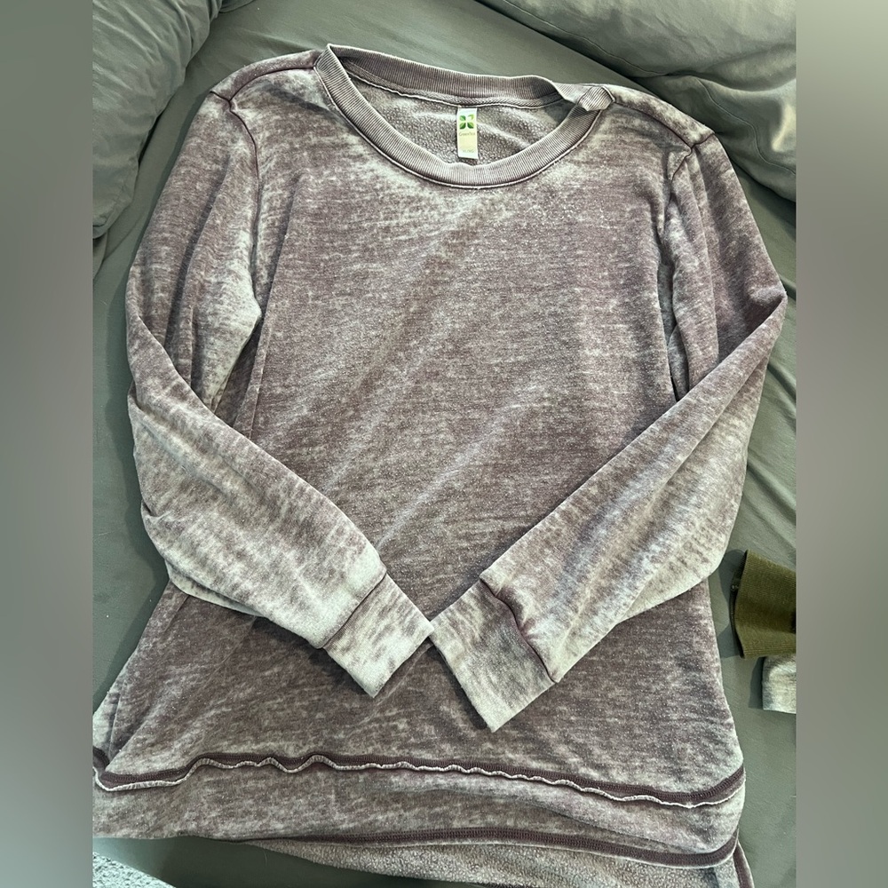 Boutique top size XL. Very soft material. It is made to look worn/vintage